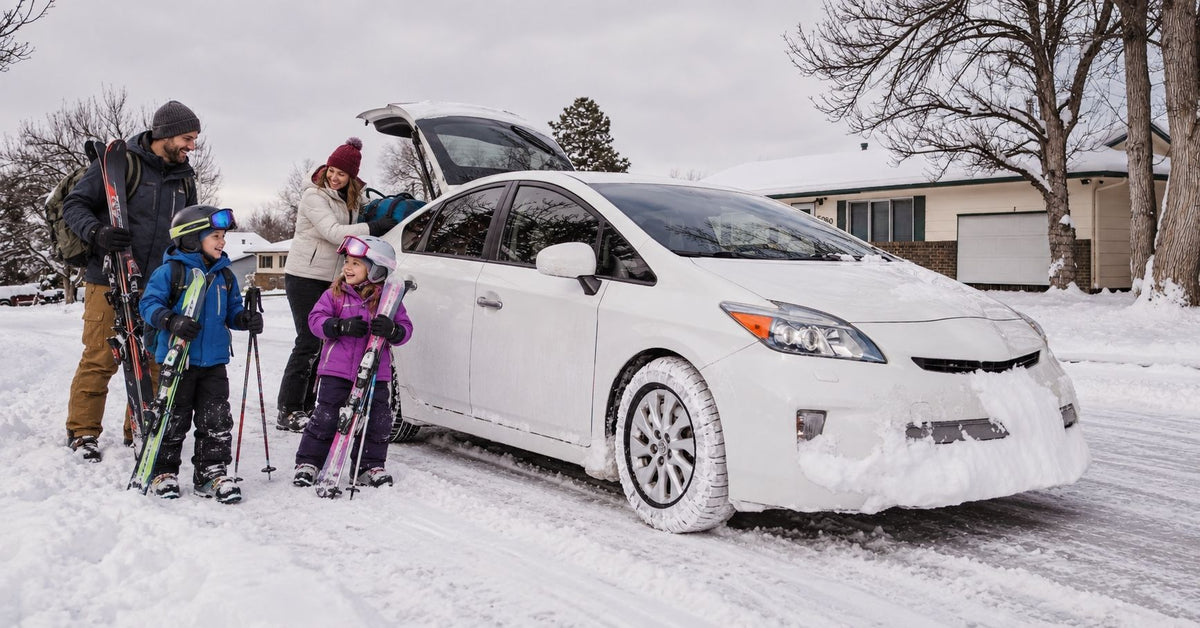 Family ski trip: Picture shows Toyota Prius with snow socks mounted